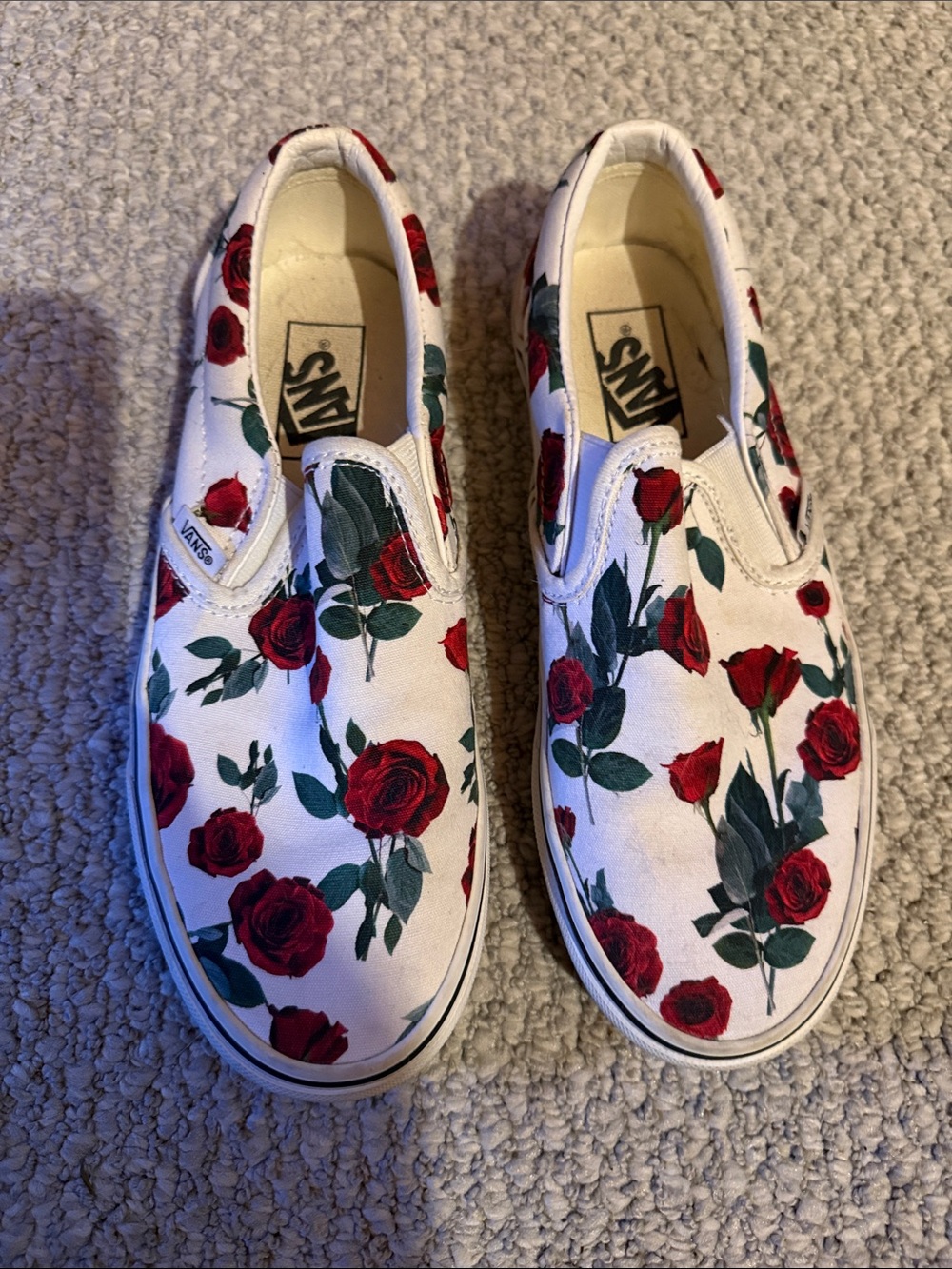 Vans Slip-On Sneakers in White with Red Rose Print